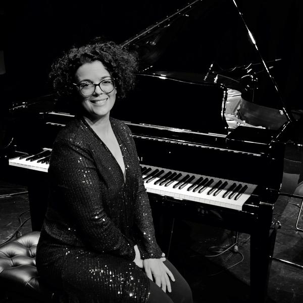 Annalisa Monticelli Portrait beside Piano