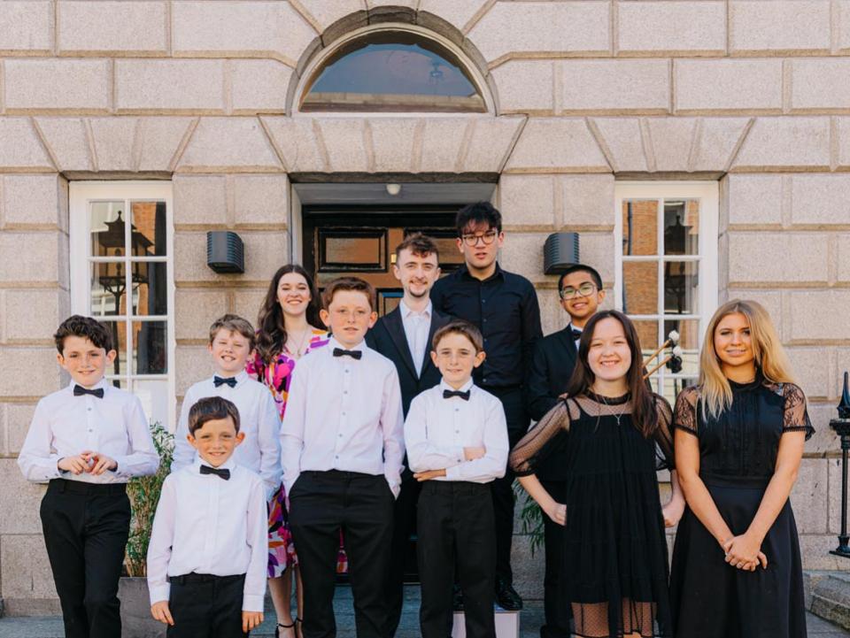 Face the Music. Back L to R. Rachael, Kevin, Sean, Rafael. Middle Oscar, Andrew, Maitiú, Dáire, Ríona, Clara. Front Rossa