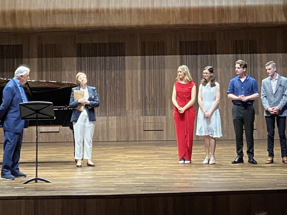 PH & DK on stage with four student winners 