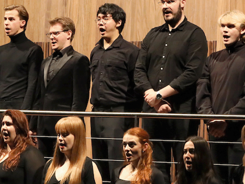 RIAM Chorale choir performing on the choir balcony of the Whyte Recital Hall