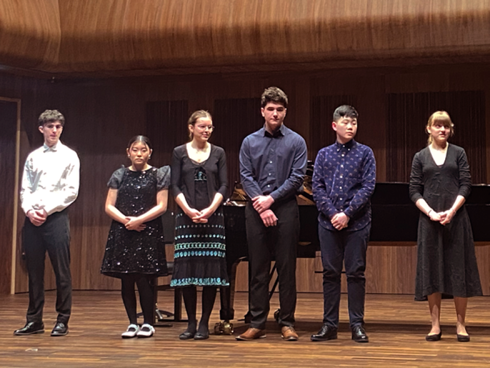 Students competing for the John Pollard Award for String Players 2025 on stage in the Whyte Recital Hall