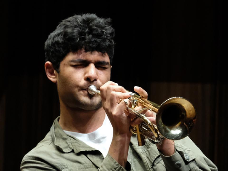 Man playing trumpet.