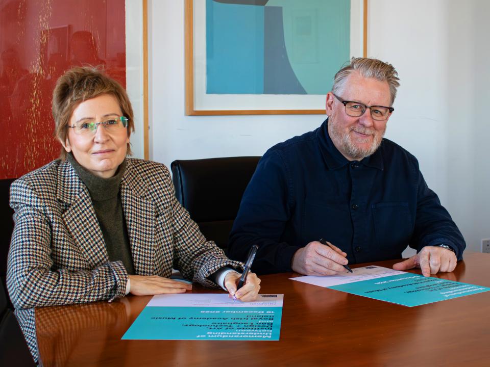 RIAM Director Deborah Kelleher and IADT President David Smith sign MOU
