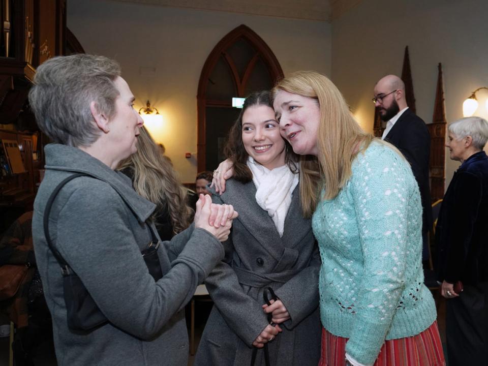 Diane Daly, Head of Strings, hugs a student at RIAM graduation ceremony 