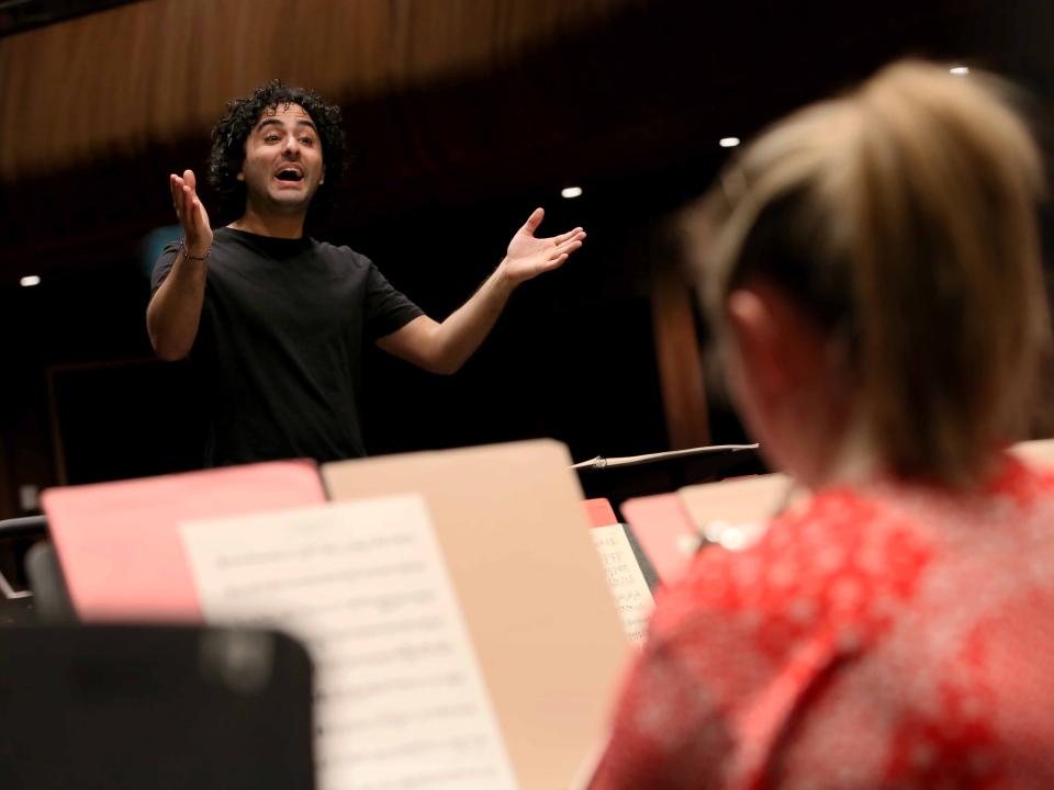 Conductor Kerem Hasan with members of the Royal Irish Academy of Music Philharmonia 