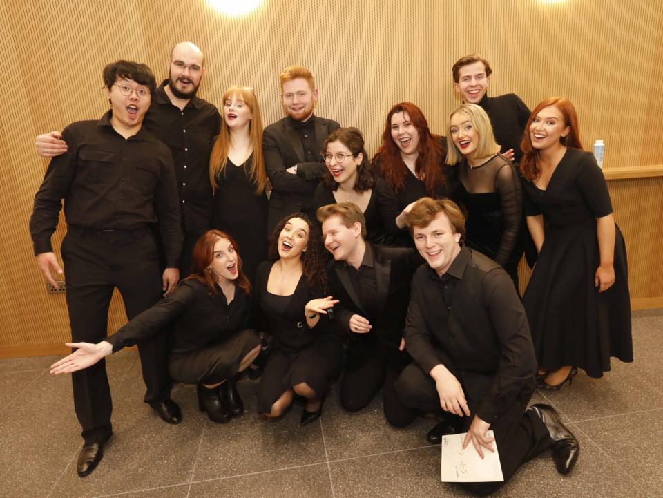 RIAM Vocal students, dressed in black, pse for a group shor at the RIAM 175 Gala Concert 