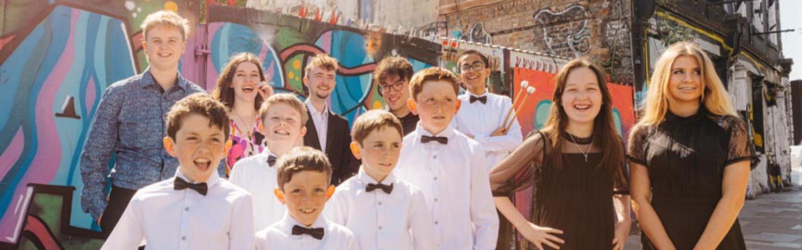 Face the Music_Back L to R Rohan, Rachael, Kevin, Sean, Rafael. Front L to R Oscar, Andrew, Rossa, Dáire, Maitiú, Ríona, Clara
