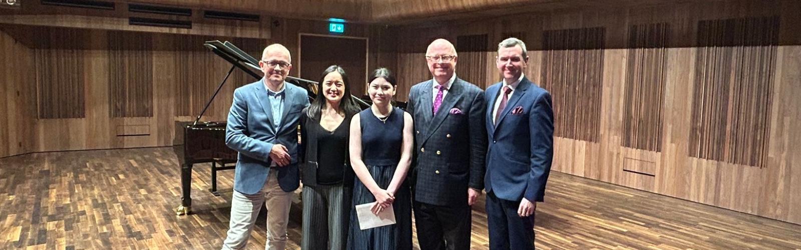 Louise Byrne is annoucned as winner of Junior Solo and is pictured with panel