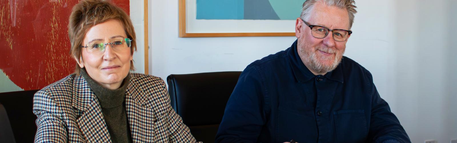 RIAM Director Deborah Kelleher and IADT President David Smith sign MOU